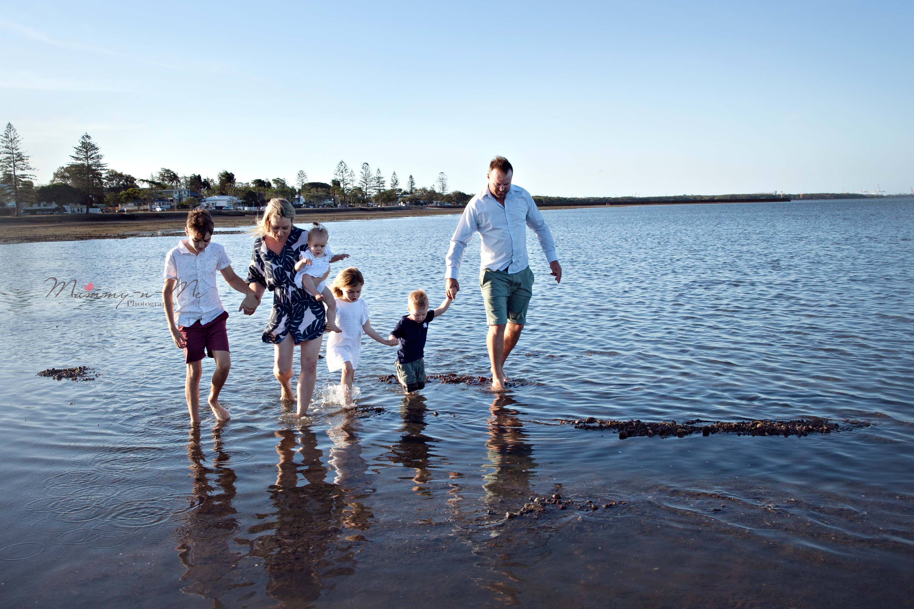 family with 4 children at the beach Brisbane Family Beach Photographer