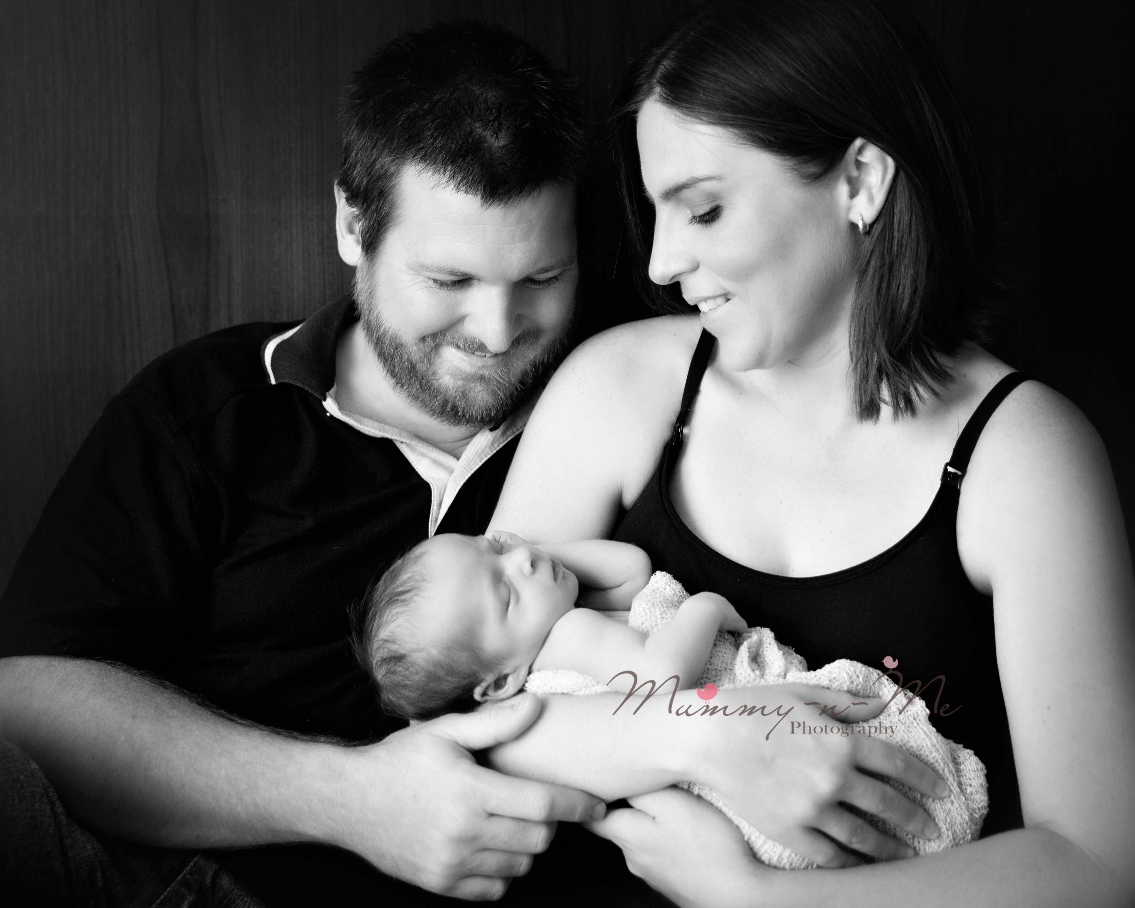 newborn girl with parents brisbane newborn photographer