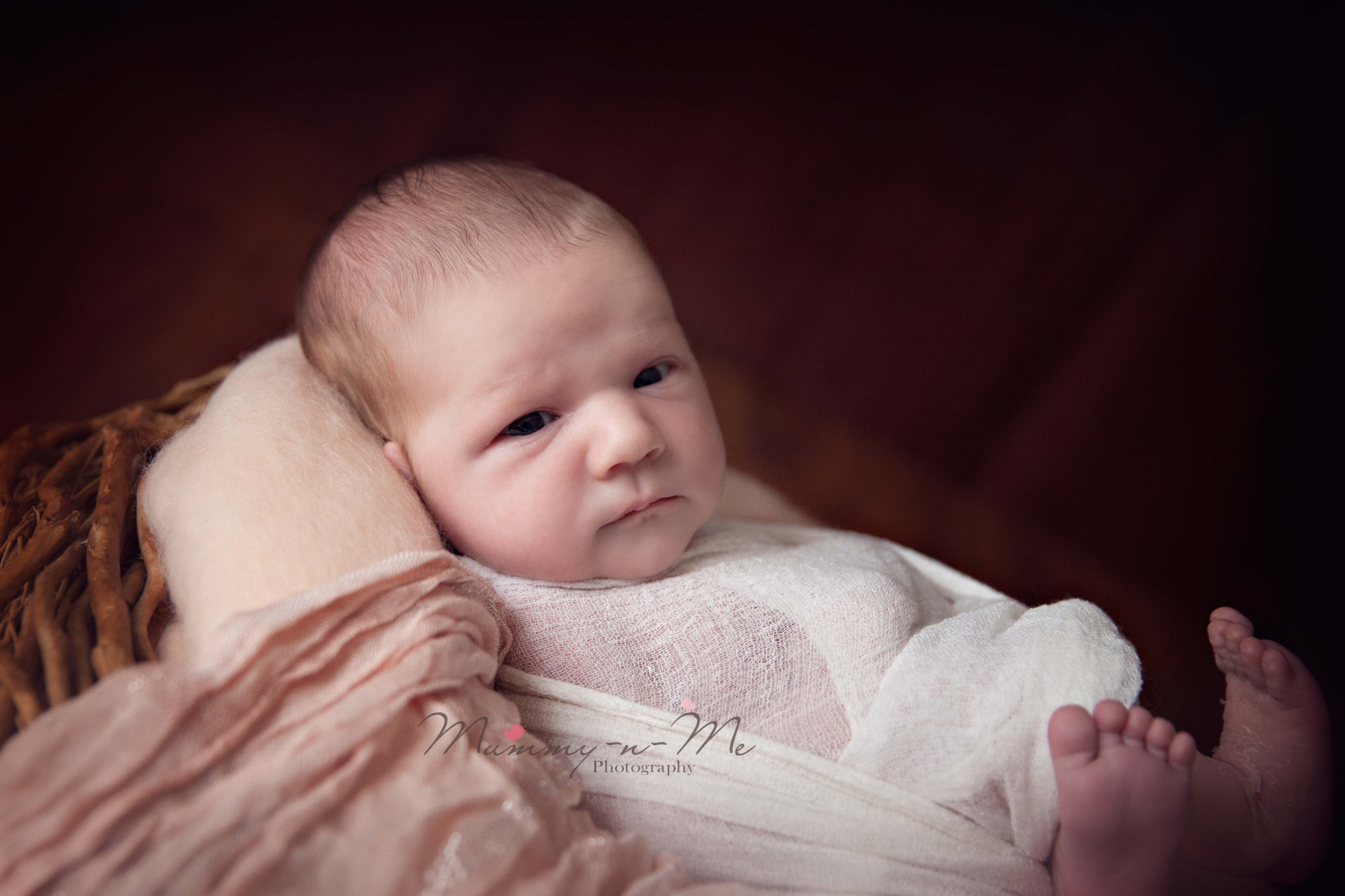 Newborn girl awake looking to camera brisbane newborn photographer