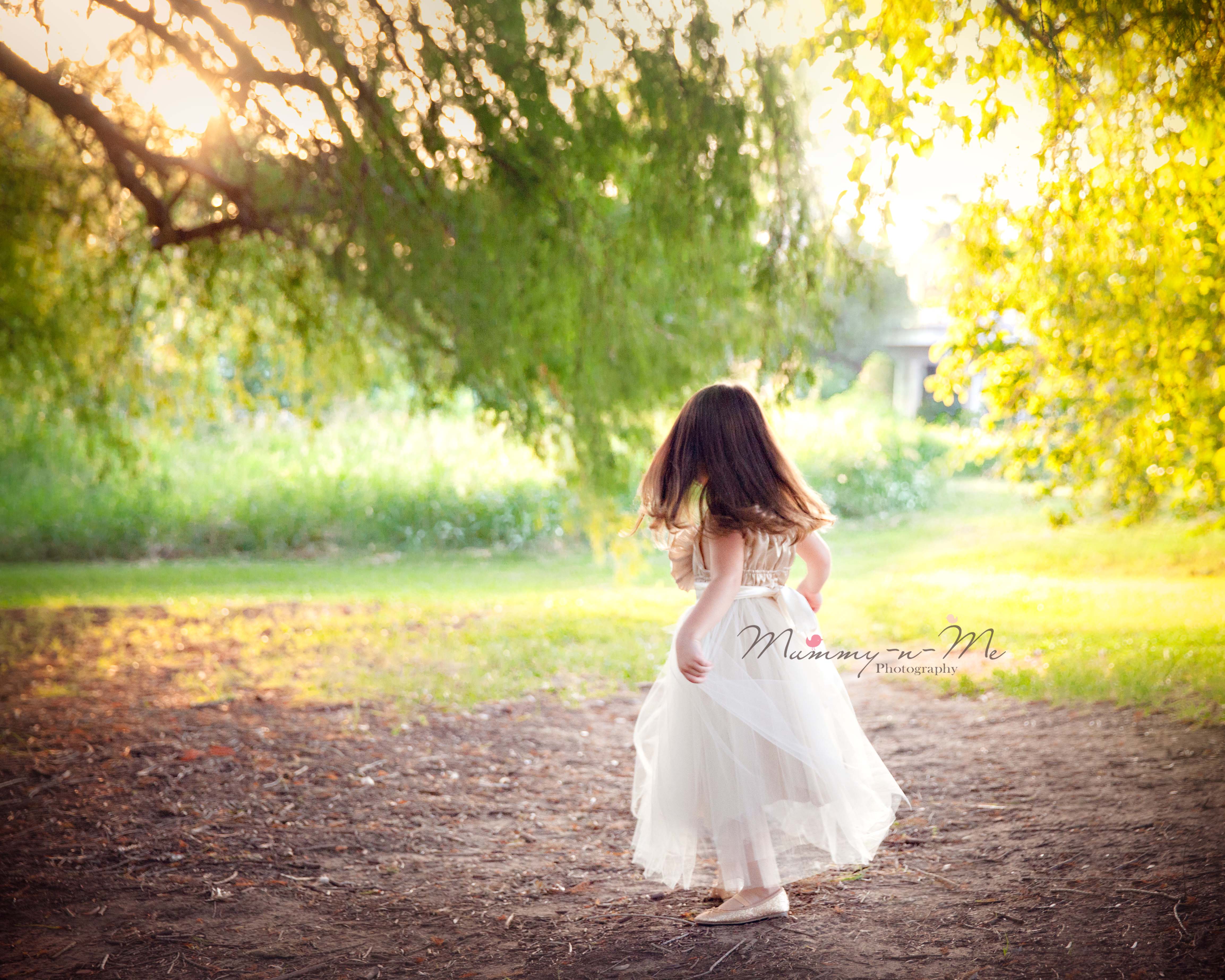 Twirling girl at park in princess dress Brisbane Family Child Photographer
