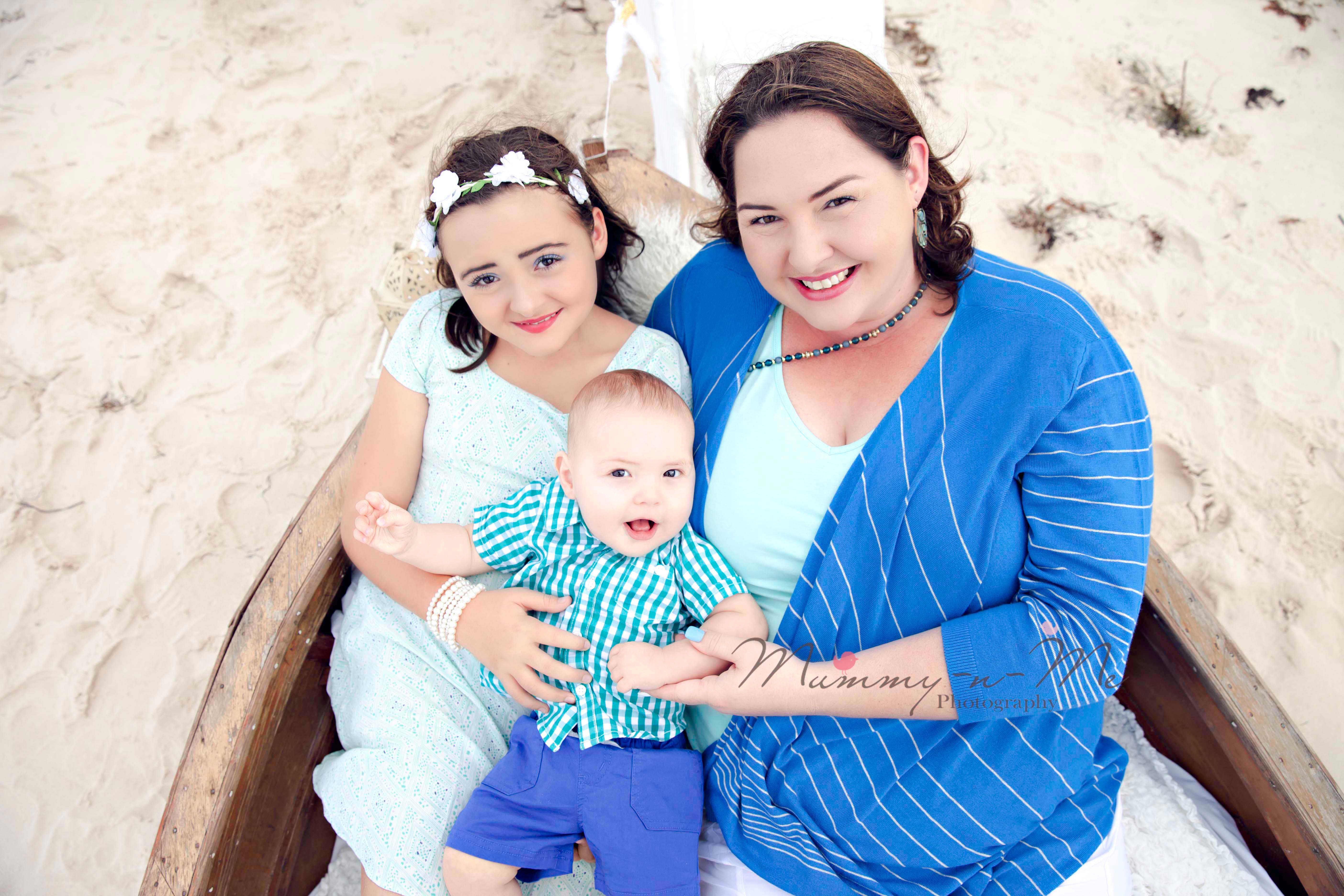 white and gold themed family session at the beach with a boat Brisbane Family Child Baby Themed Photographer