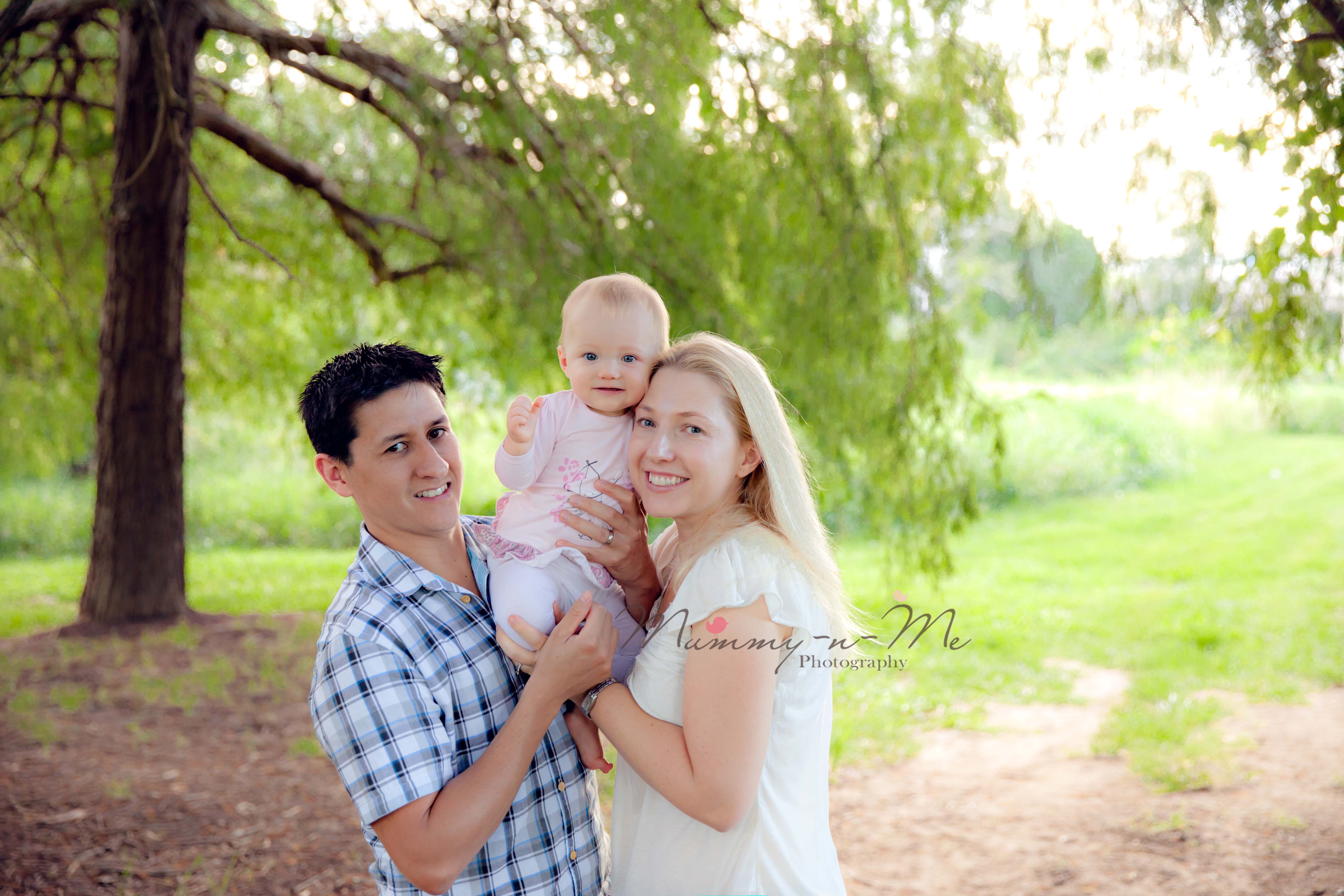 baby girl with family in park Brisbane Family Child Baby Photographr