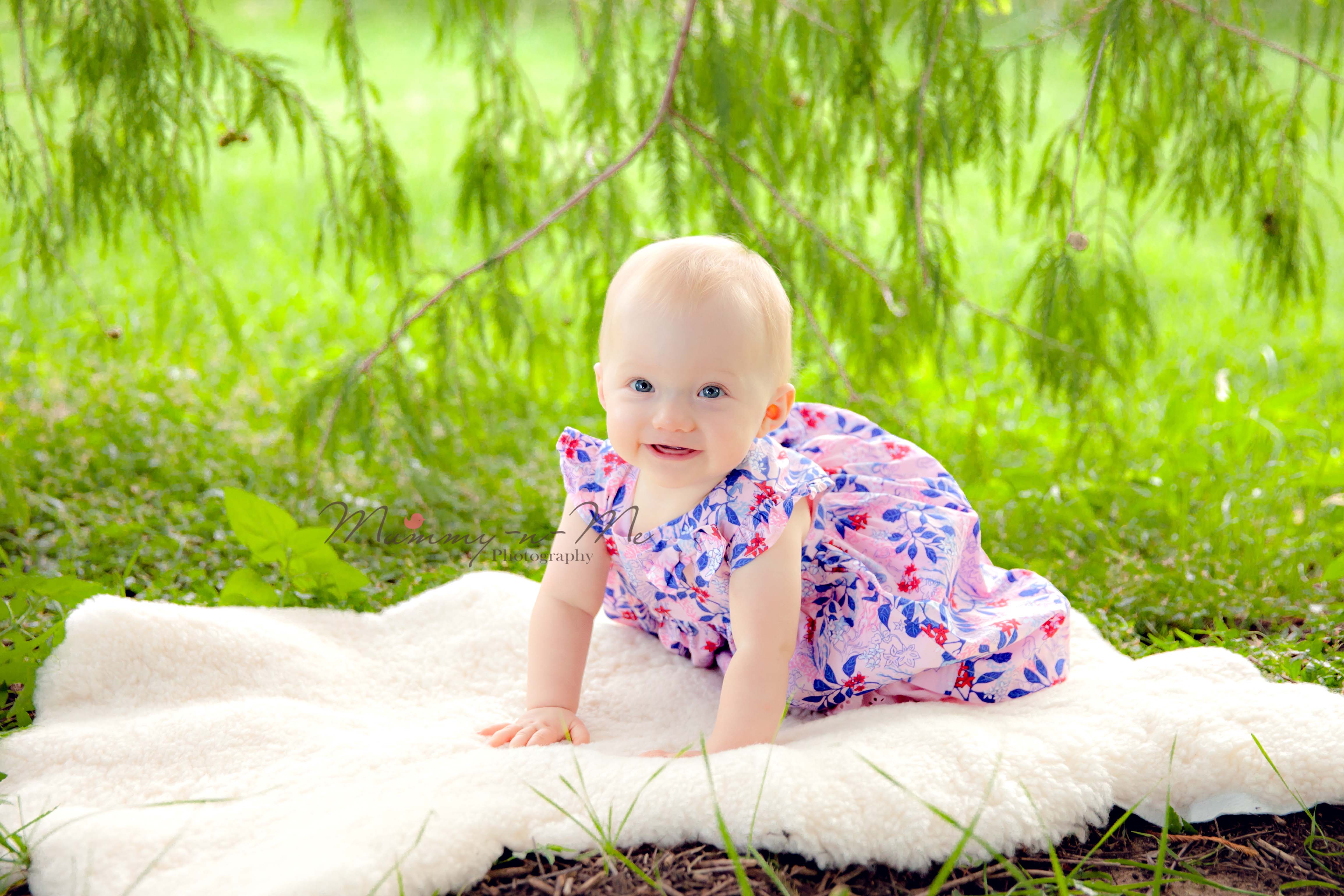 baby girl on lambs wool in park Brisbane Family Child Baby Photographer