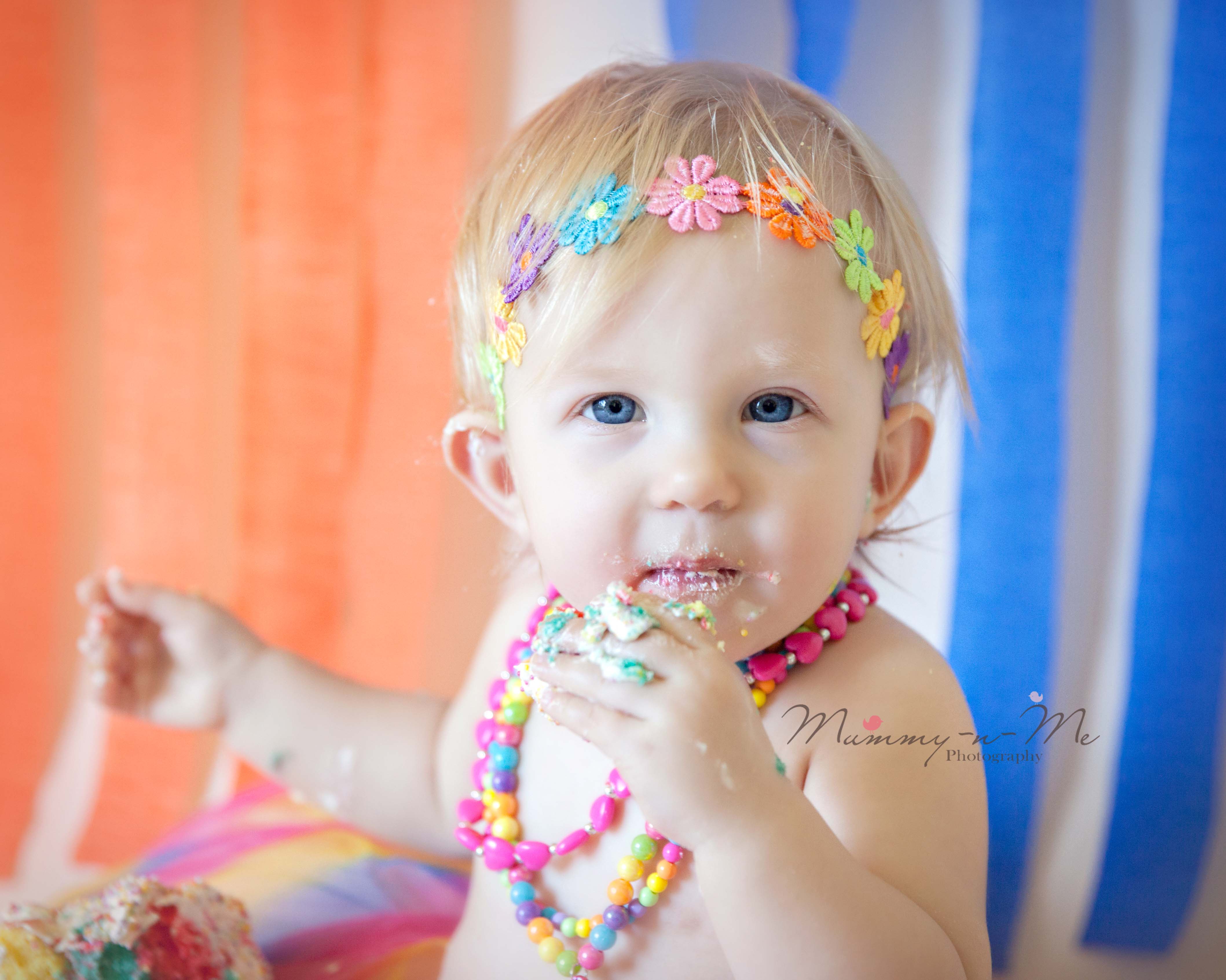 First birthday celebrations little girl rainbow cake smash Brisbane Family Child Cake Smash Photographer